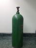 tall air bottle, color green, used.